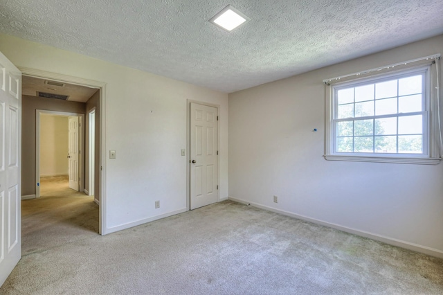 2010 Hartland Rd, Franklin, TN 37069 - unfurnished room featuring carpet flooring and a textured ceiling