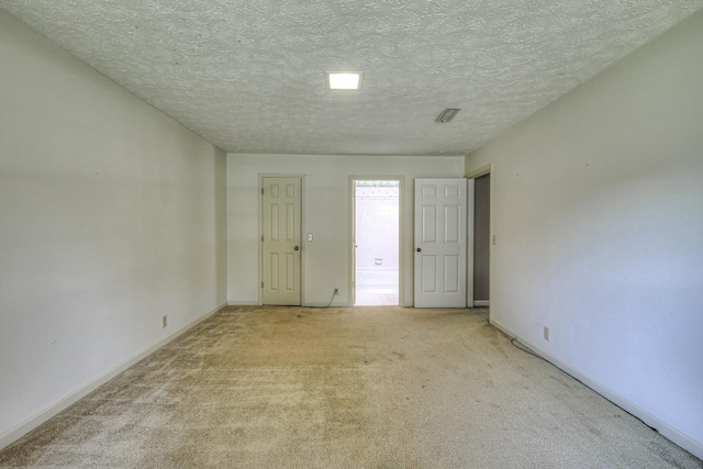 2010 Hartland Rd, Franklin, TN 37069 - unfurnished room with light colored carpet and a textured ceiling