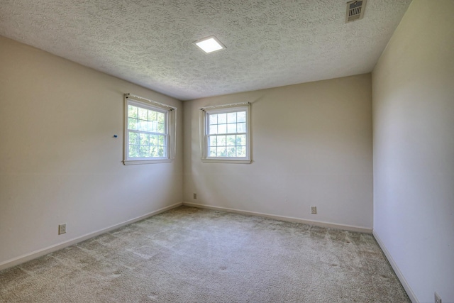 2010 Hartland Rd, Franklin, TN 37069 - unfurnished room featuring a textured ceiling and carpet floors