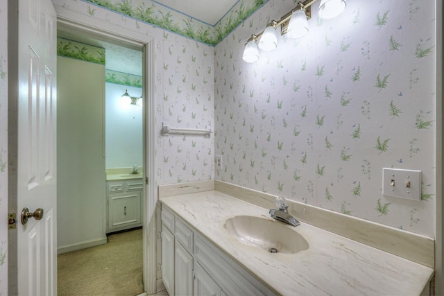 2010 Hartland Rd, Franklin, TN 37069 - bathroom featuring vanity and wallpapered walls