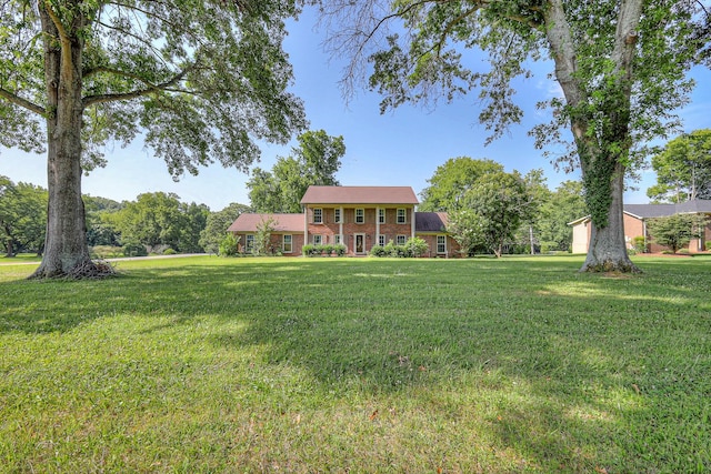 2010 Hartland Rd, Franklin, TN 37069 - view of front of house featuring a front yard and brick siding