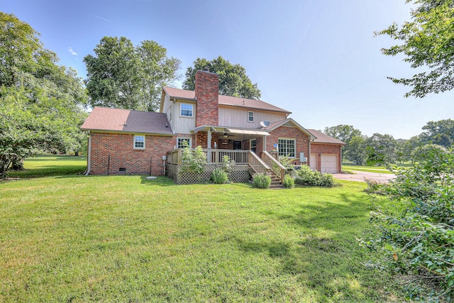2010 Hartland Rd, Franklin, TN 37069 - back of property with an attached garage, brick siding, a yard, a chimney, and dirt driveway