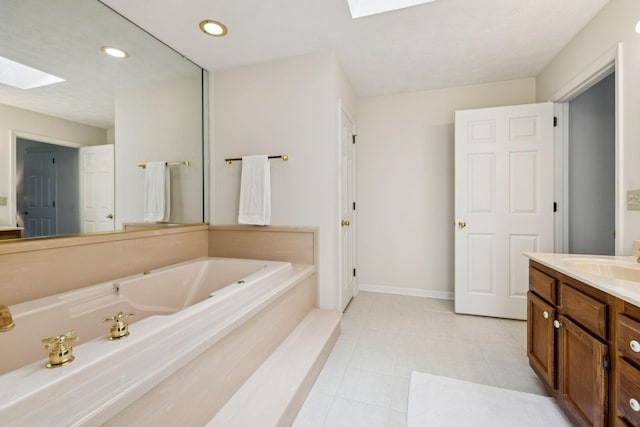217 Fox Hunt Ln, Lebanon, TN 37087 - full bath with a skylight, vanity, a garden tub, and recessed lighting
