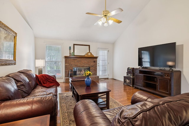 217 Fox Hunt Ln, Lebanon, TN 37087 - living area with ceiling fan, wood finished floors, a fireplace, and high vaulted ceiling
