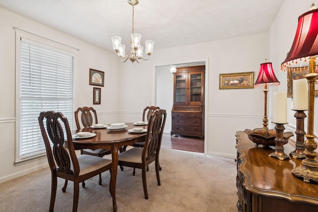 217 Fox Hunt Ln, Lebanon, TN 37087 - dining area featuring light colored carpet and a chandelier