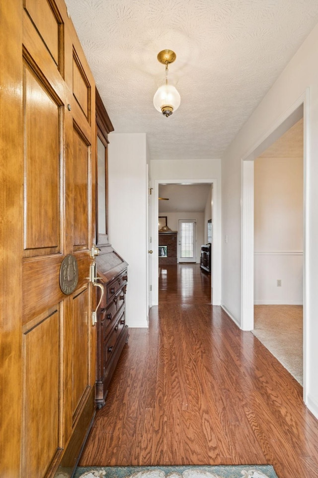 217 Fox Hunt Ln, Lebanon, TN 37087 - hallway featuring dark wood finished floors and a textured ceiling
