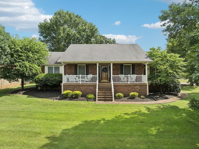 217 Fox Hunt Ln, Lebanon, TN 37087 - view of front of property with a porch, brick siding, a front yard, and stairway