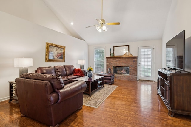 217 Fox Hunt Ln, Lebanon, TN 37087 - living area with high vaulted ceiling, wood finished floors, a ceiling fan, and a fireplace