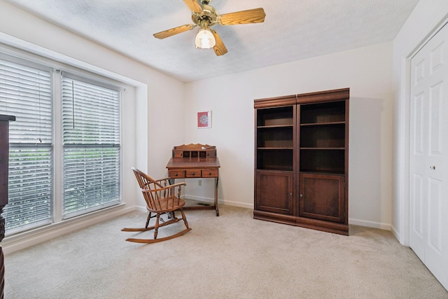 217 Fox Hunt Ln, Lebanon, TN 37087 - living area featuring carpet, a ceiling fan, and a textured ceiling