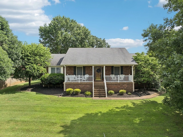 217 Fox Hunt Ln, Lebanon, TN 37087 - single story home with brick siding, covered porch, a front yard, and stairs