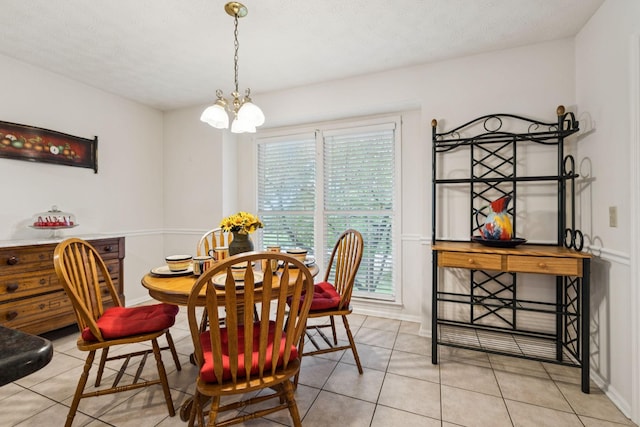 217 Fox Hunt Ln, Lebanon, TN 37087 - tiled dining space with a chandelier and baseboards