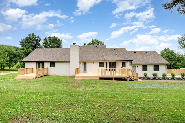 1026 Carthage Hwy, Lebanon, TN 37087 - rear view of house featuring a chimney, a wooden deck, a yard, and roof with shingles
