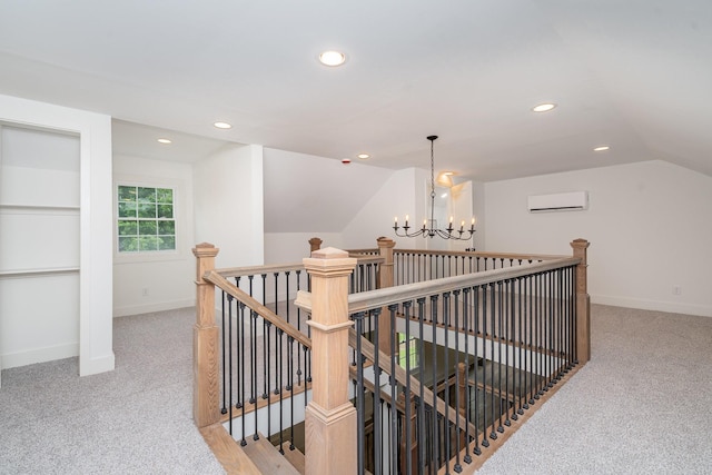 1026 Carthage Hwy, Lebanon, TN 37087 - corridor featuring an upstairs landing, light colored carpet, a wall mounted air conditioner, lofted ceiling, and recessed lighting