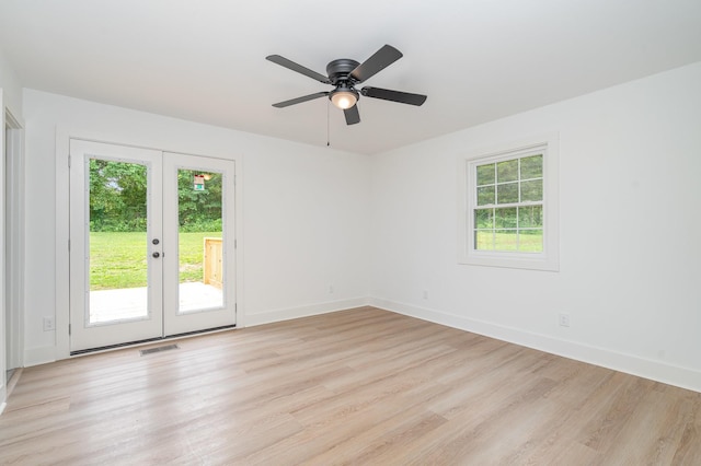 1026 Carthage Hwy, Lebanon, TN 37087 - empty room with french doors, light wood-type flooring, and ceiling fan