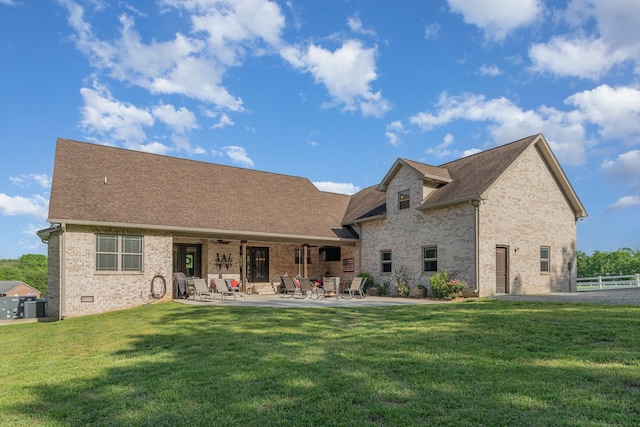 398 Beasleys Bend Rd, Lebanon, TN 37087 - rear view of property featuring brick siding, a patio, and roof with shingles