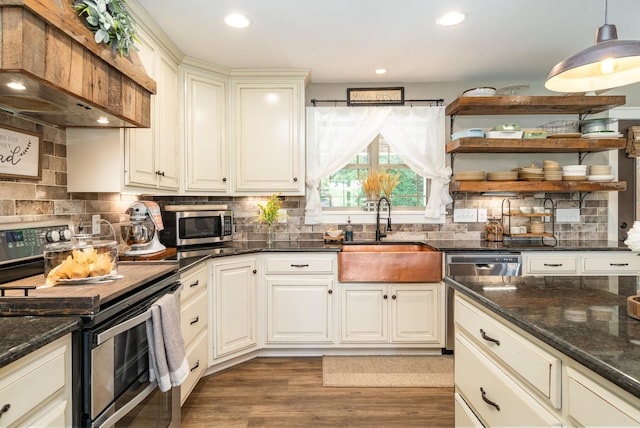 398 Beasleys Bend Rd, Lebanon, TN 37087 - kitchen featuring appliances with stainless steel finishes, custom exhaust hood, open shelves, wood finished floors, and backsplash