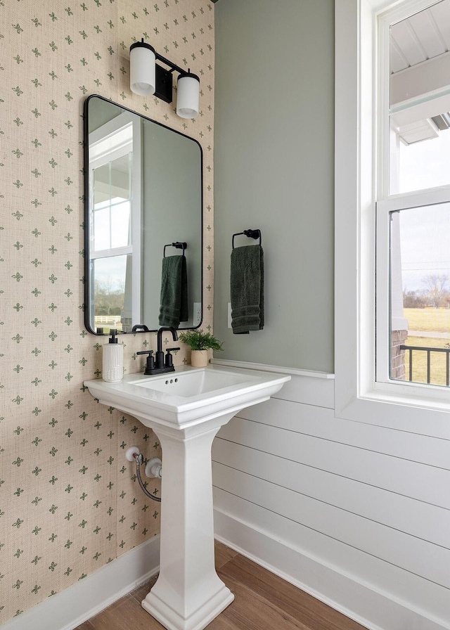 1224 Ben Forkum Dr, Lebanon, TN 37087 - bathroom featuring wallpapered walls, plenty of natural light, and wood finished floors