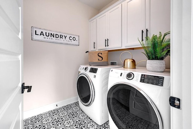1107 Willow Springs Dr, Lebanon, TN 37087 - washroom with cabinet space and washing machine and clothes dryer
