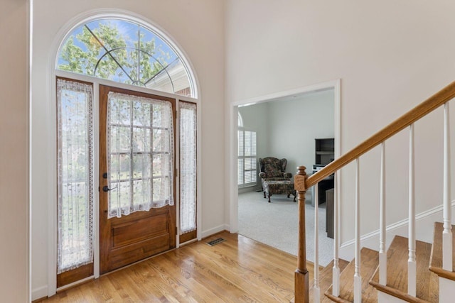 7125 Locksley Ln, Fairview, TN 37062 - foyer featuring stairs and wood finished floors