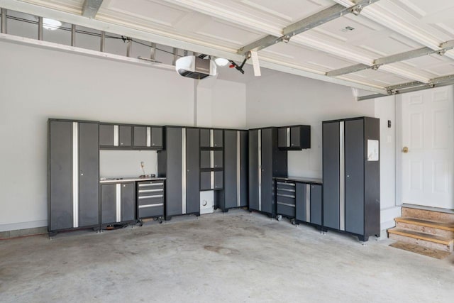 7125 Locksley Ln, Fairview, TN 37062 - garage featuring a garage door opener