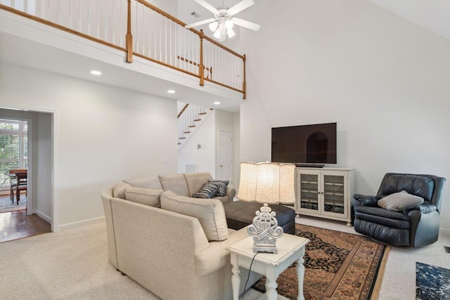 7125 Locksley Ln, Fairview, TN 37062 - living room featuring a high ceiling, carpet, stairs, a ceiling fan, and recessed lighting