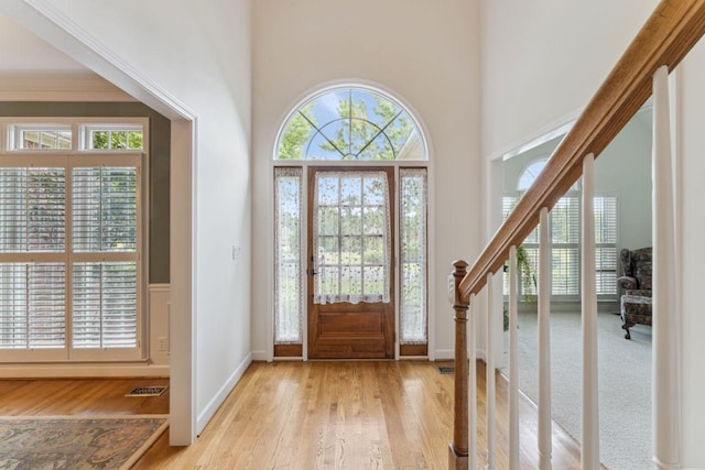 7125 Locksley Ln, Fairview, TN 37062 - entryway with hardwood / wood-style flooring, a towering ceiling, and stairway