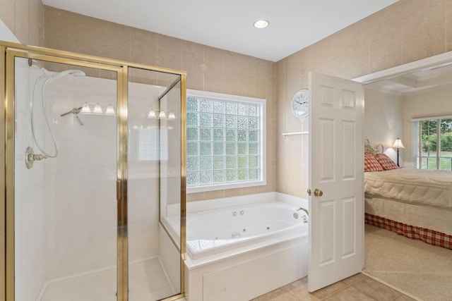 7125 Locksley Ln, Fairview, TN 37062 - ensuite bathroom with a tub with jets, tile patterned flooring, a stall shower, and recessed lighting