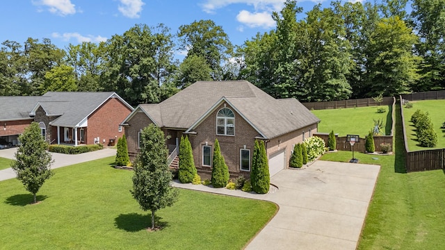 29 Harbor Pt, Lebanon, TN 37087 - view of front of house with concrete driveway, brick siding, a garage, and a shingled roof