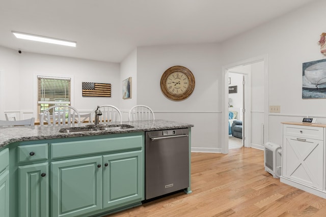 29 Harbor Pt, Lebanon, TN 37087 - kitchen featuring stainless steel dishwasher, light wood-style floors, and light stone countertops
