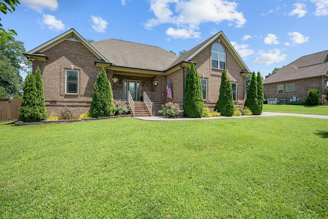 29 Harbor Pt, Lebanon, TN 37087 - view of front of property with brick siding, a front yard, and covered porch