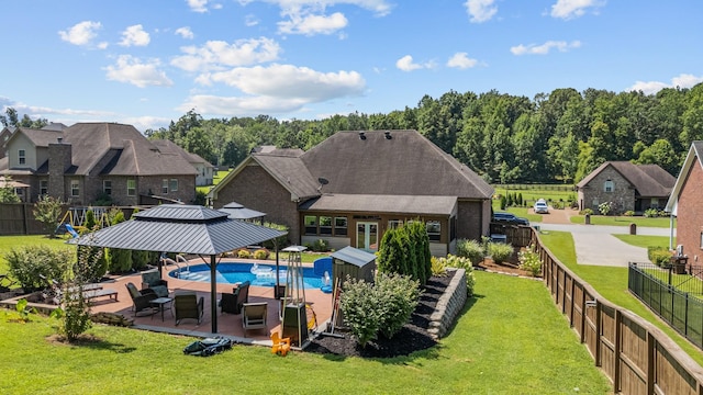 29 Harbor Pt, Lebanon, TN 37087 - view of swimming pool featuring a fenced backyard, an outdoor structure, a patio area, and a residential view