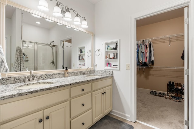 29 Harbor Pt, Lebanon, TN 37087 - bathroom with a stall shower, double vanity, and a walk in closet