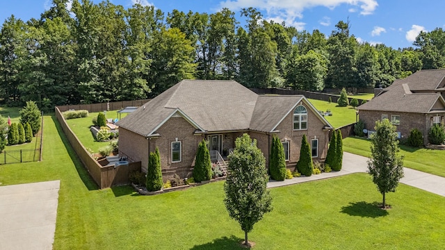 29 Harbor Pt, Lebanon, TN 37087 - view of front of home featuring brick siding, concrete driveway, and roof with shingles