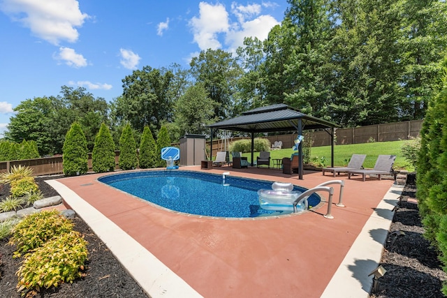 29 Harbor Pt, Lebanon, TN 37087 - view of swimming pool with a gazebo, a patio, a fenced backyard, and a storage shed