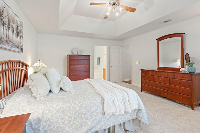 513 Foxcroft Cir, Franklin, TN 37067 - bedroom featuring carpet, a tray ceiling, ensuite bath, and ceiling fan