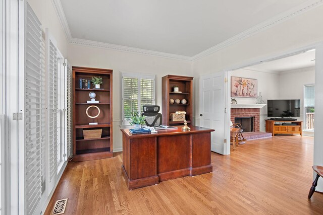 513 Foxcroft Cir, Franklin, TN 37067 - office space featuring light wood-style floors, a brick fireplace, and ornamental molding