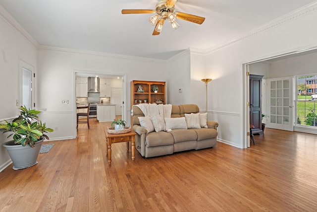 513 Foxcroft Cir, Franklin, TN 37067 - living room featuring light wood-style flooring, ceiling fan, and crown molding