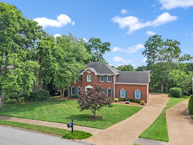 513 Foxcroft Cir, Franklin, TN 37067 - view of front of home with a front lawn and brick siding
