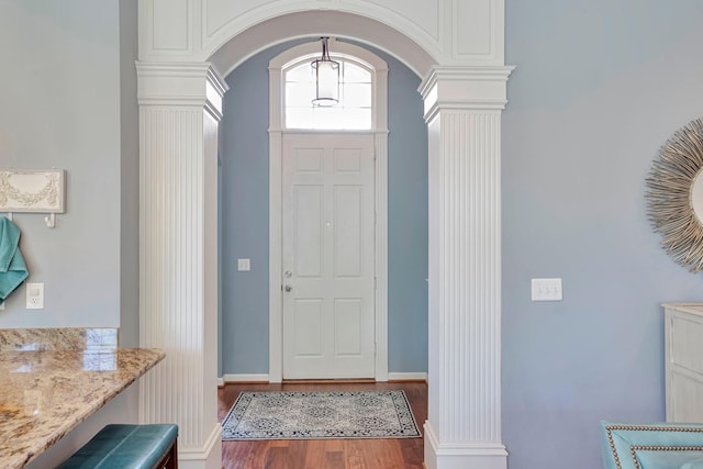 3045 Sakari Cir, Spring Hill, TN 37174 - entryway with ornate columns, arched walkways, and wood finished floors