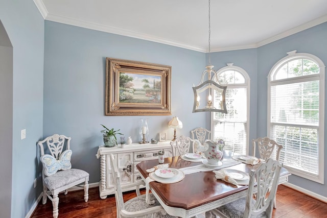 3045 Sakari Cir, Spring Hill, TN 37174 - dining space with wood finished floors, a chandelier, crown molding, and arched walkways