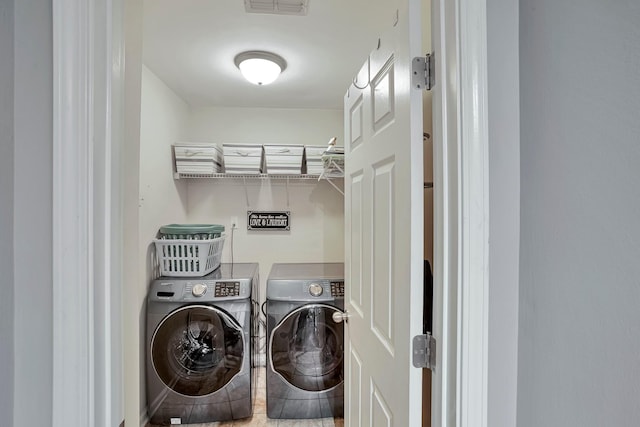 3045 Sakari Cir, Spring Hill, TN 37174 - laundry area featuring separate washer and dryer