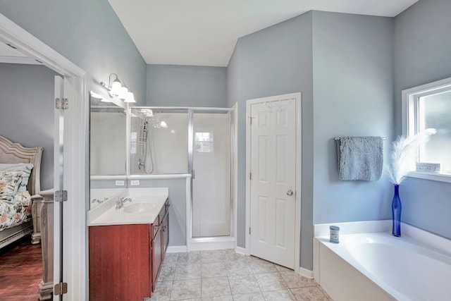 3045 Sakari Cir, Spring Hill, TN 37174 - ensuite bathroom with vanity, a shower stall, and a bath