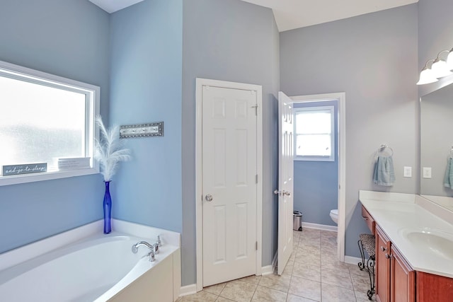 3045 Sakari Cir, Spring Hill, TN 37174 - full bath with vanity, a garden tub, and tile patterned flooring