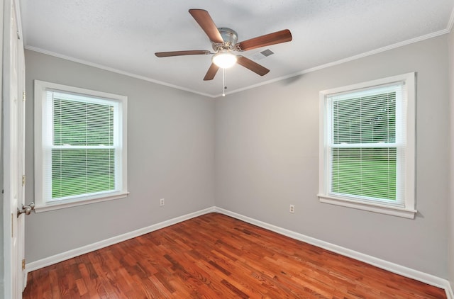 274 Spring Hill Rd, Stanton, TN 38069 - spare room with wood finished floors, ceiling fan, and ornamental molding