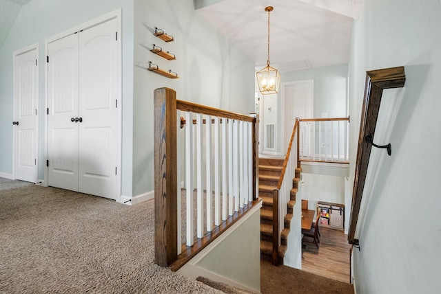 2210 Indian Mound Rd, Woodlawn, TN 37191 - stairs with carpet and a chandelier