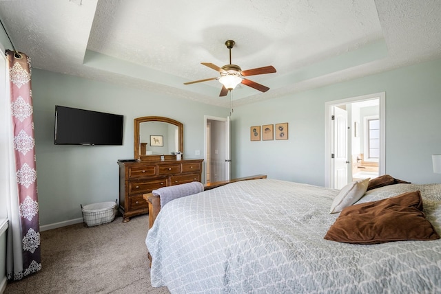 2210 Indian Mound Rd, Woodlawn, TN 37191 - carpeted bedroom featuring a raised ceiling, a textured ceiling, and a ceiling fan