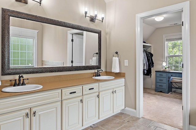 1011 Glessner Dr, Spring Hill, TN 37174 - full bathroom featuring double vanity and a walk in closet