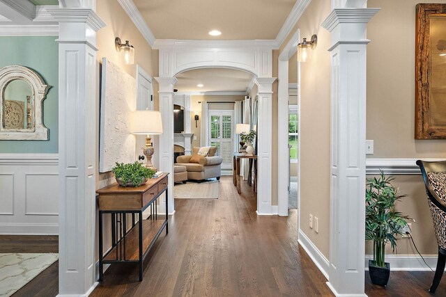 1011 Glessner Dr, Spring Hill, TN 37174 - hall with decorative columns, dark wood-type flooring, arched walkways, crown molding, and recessed lighting
