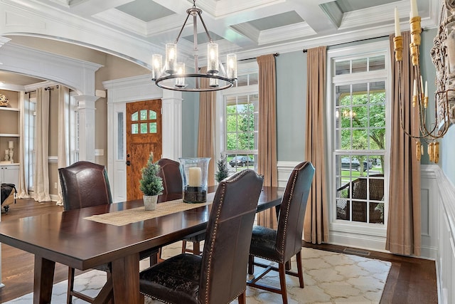 1011 Glessner Dr, Spring Hill, TN 37174 - dining area featuring a chandelier, crown molding, coffered ceiling, decorative columns, and arched walkways