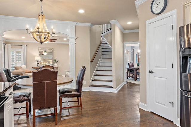 1011 Glessner Dr, Spring Hill, TN 37174 - dining area featuring ornamental molding, dark wood-style floors, a chandelier, ceiling fan, and stairway